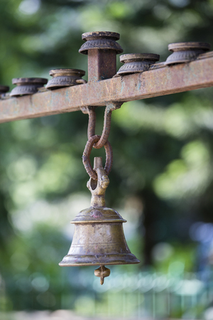 Prayer bell hanging at temple entrance. Kathmandu, Nepal . Close upの写真素材