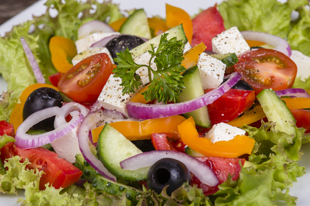 Fresh vegetable greek salad on the table. Close upの写真素材