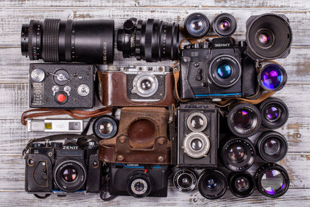 KIEV, UKRAINE - JULY 14. 2017 : illustrative editorial of various vintage photo cameras (35mm film) and old lenses made in USSR, close upのeditorial素材