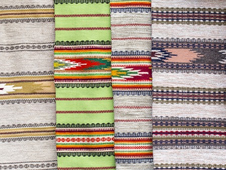 Traditional beautiful colored woolen blankets on the street market in the Carpathians, Ukraine....