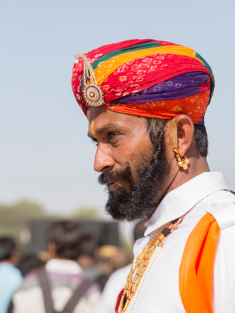 JAISALMER, INDIA - FEBRUARY 08, 2017 : Indian men wearing traditional Rajasthani dress participate in Mr. Desert contest as part of Desert Festival in Jaisalmer, Rajasthan, India. Close upのeditorial素材