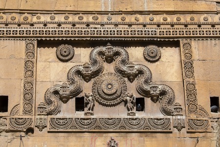 Indian ornament on wall of palace in Jaisalmer fort, India. Close upの写真素材