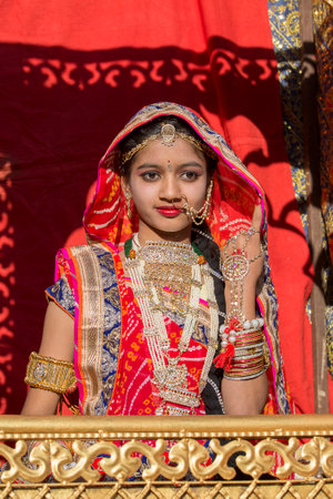 JAISALMER, INDIA - FEBRUARY 08, 2017 : Indian girl wearing traditional Rajasthani dress participate in Desert Festival in Jaisalmer, Rajasthan, Indiaのeditorial素材