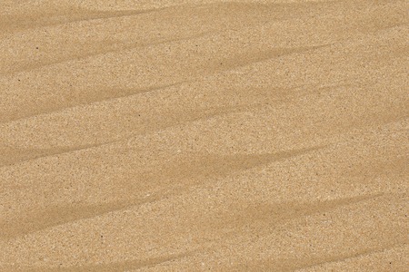 Beach sand texture background, close upの写真素材
