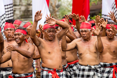 GIANYAR, BALI, INDONESIA - JANUARY 08, 2018 :Unknown Balinese old men participates in street ceremony, during a pre-election rally the Indonesian Democratic Party of Struggle in island Bali, Indonesiaのeditorial素材