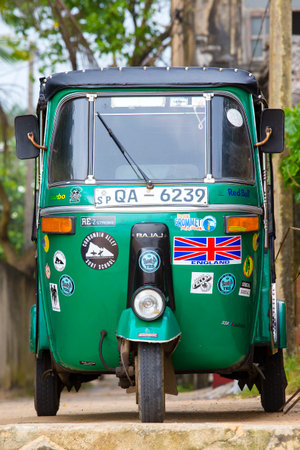 MIRISSA, SRI LANKA - NOVEMBER 11, 2014: Auto rickshaw or tuk-tuk on the street of Mirissa. Most tuk-tuks in Sri Lanka are a slightly modified Indian Bajaj model, imported from India.のeditorial素材