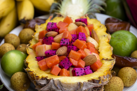 Fresh tropical fruit salad stuffed in pineapple - healthy breakfast, weight loss concept. Thailand, close upの写真素材