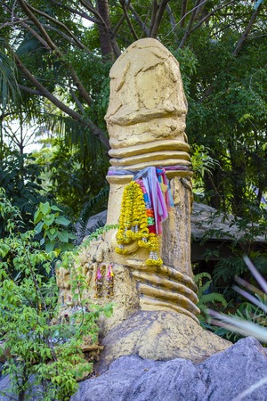 Golden religious penis sculpture on the island of Koh Samui, Thailand. Close upの写真素材