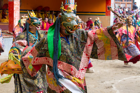 LAMAYURU, INDIA - JUNE 14, 2015 : Unidentified buddhist lamas dressed in mystical mask dancing Tsam mystery dance in time of Yuru Kabgyat Buddhist festival at Lamayuru Gompa, Ladakh, North Indiaのeditorial素材