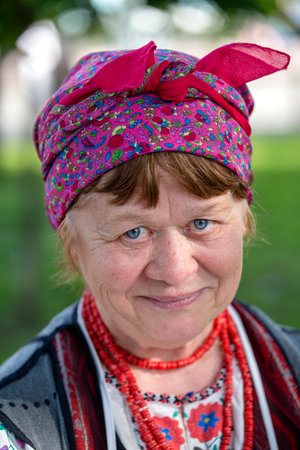 KIEV, UKRAINE - MAY 05, 2018 : Ethno-fest : traditions - emotions - life. Portrait of an elderly woman in Ukrainian national clothes, historical reconstruction of ancient Kiev, Ukraineのeditorial素材