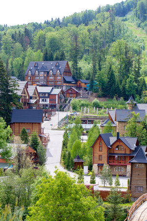 MIGOVO, UKRAINE - MAY 10, 2018 : Architecture of the resort town of Migovo in the Carpathian Mountains, Ukraine. Concept of ecological tourismのeditorial素材
