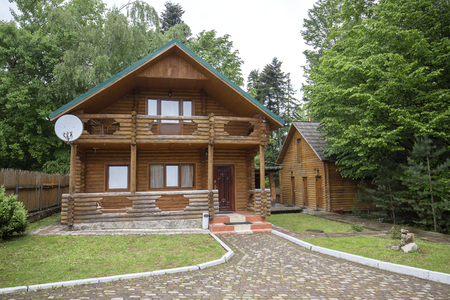 Ecological wooden house from beams in countryside, Transcarpathia, Ukraineの写真素材