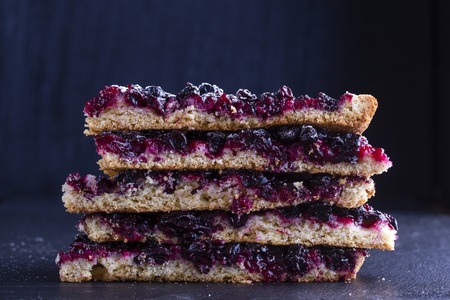 Homemade organic currant pie dessert ready to eat . Currant tart, close up