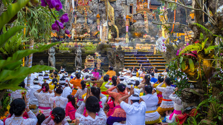 UBUD, BALI, INDONESIA - MARCH 24, 2018 : Unidentified Indonesian people praying at holy temple...