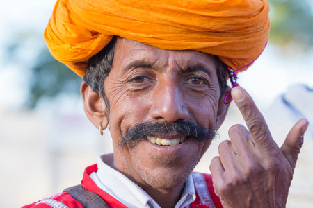 JAISALMER, INDIA - FEBRUARY 08, 2017 : Unidentified men wearing traditional Rajasthani dress participate in Mr. Desert contest as part of Desert Festival in Jaisalmer, Rajasthan, India. Close upのeditorial素材