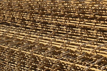 Reinforcing bars with a periodic profile in the packs are stored in the metal products warehouse,...