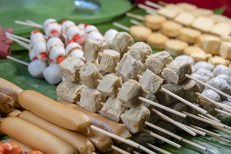 Fried food with sticks, Thai style food, Street food in Bangkok, Thailand, close up