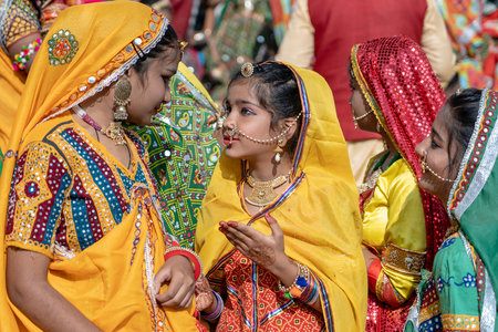 PUSHKAR, INDIA - NOVEMBER 16, 2018 : Indian young girl in the desert Thar on time Pushkar Camel Mela near holy city Pushkar, Rajasthan, India, close up portraitのeditorial素材