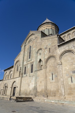 Old Orthodox cathedral in historical town Mtskheta near Tbilisi, Georgia. Autumn sunny day.