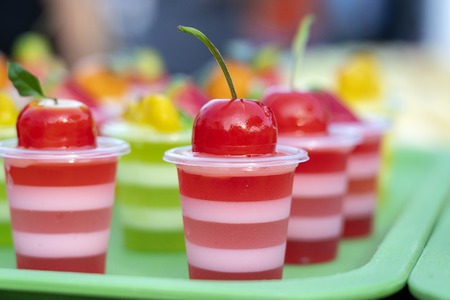 Cherry jelly with cherries for sale in the street market, Thailand, close upの写真素材