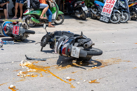 KOH PHANGAN, THAILAND - MAY 19, 2019 : Motorcycle accident that happened on the road at tropical island Koh Phangan, Thailand . Traffic accident between a motorcycle on streetのeditorial素材