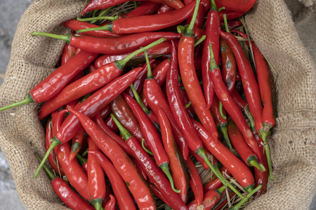 Red chili pepper for sell in traditional street market in Ubud, Bali, Indonesia , close up