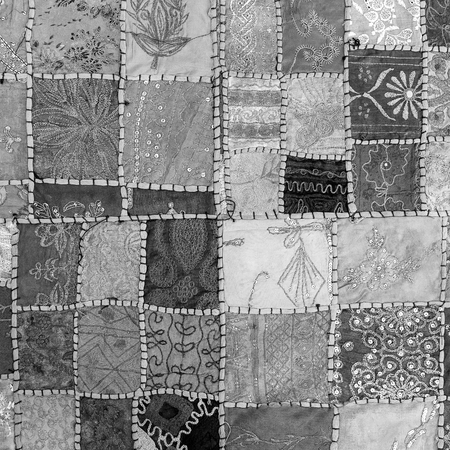 Detail old patchwork carpet. Black and white. Close upの写真素材