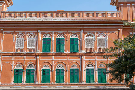 Hawa Mahal, pink palace of winds in old city Jaipur, Rajasthan, India. Background of indian...