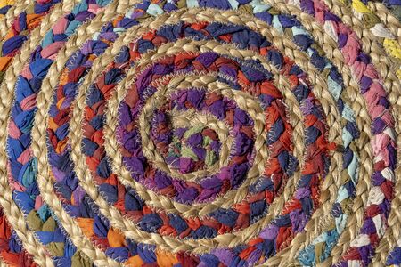 Rough texture of woven cloth, close up of cloth texture, detail handicraft fabric weaving background. Wicker handmade mat surface, top viewの写真素材