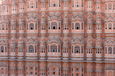 Hawa Mahal, pink palace of winds in old city Jaipur, Rajasthan, India. Background of indian architecture, close upのeditorial素材