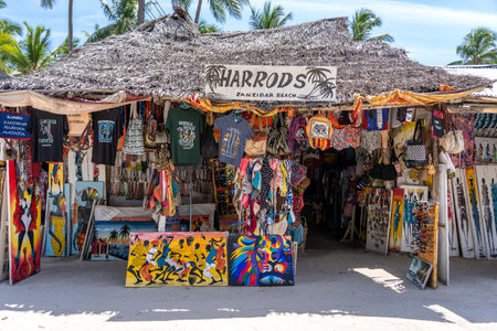Zanzibar, Tanzania - january 04, 2020 : Front view of African shop clothes and souvenirs for tourists on the beach in Zanzibar island, Tanzania, east Africaのeditorial素材
