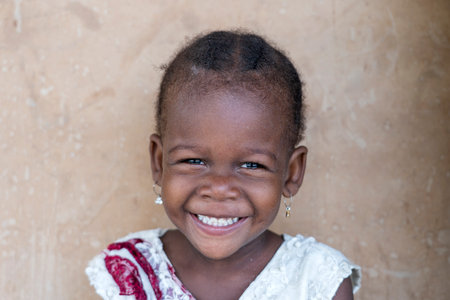 Zanzibar, Tanzania - january 15, 2020 : Unknown african young girl on a street of Zanzibar island, Tanzania, East Africa, close upのeditorial素材