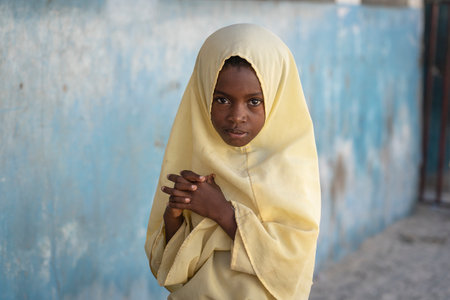 Zanzibar, Tanzania - october 29, 2019 : Unidentified african girl in a local school in island Zanzibar, Tanzania, East Africaのeditorial素材