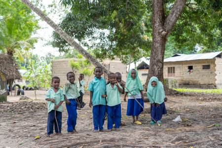 Zanzibar, Tanzania - october 30, 2019 : Unidentified african girls and boys near a local school after class in island Zanzibar, Tanzania, East Africaのeditorial素材