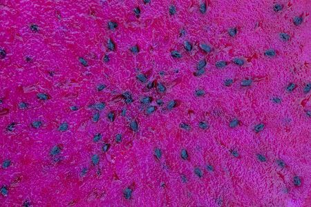 Exotic pink dragonfruit cut macro photo on background. Dragon fruit close up. Pitahaya texture photo. Sweet tropical fruit, juicy pitaya cut, Vietnamの写真素材