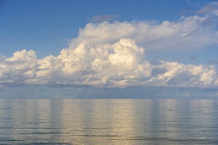 Tropical beach and summer sea water with blue sky and white clouds on the island of Phu Quoc,...