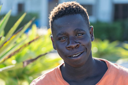 Zanzibar, Tanzania - january11, 2020 : Unknown african young guy on the beach of Zanzibar island, Tanzania, East Africa, close upのeditorial素材