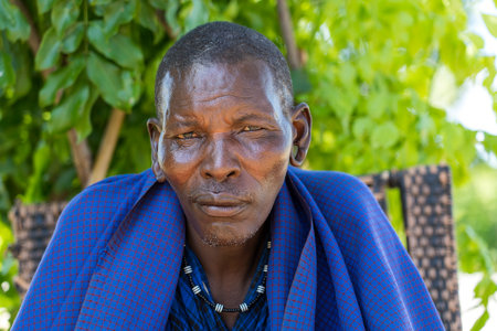 Zanzibar, Tanzania - january 14, 2020 : African man masai dressed in traditional clothes on street in Zanzibar island, Tanzania, east Africaのeditorial素材
