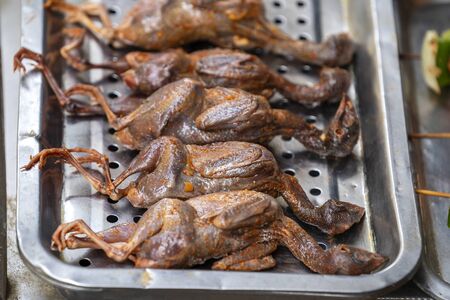 Chicken on sale in street food market in mountain village Sapa, Vietnam, close upの写真素材