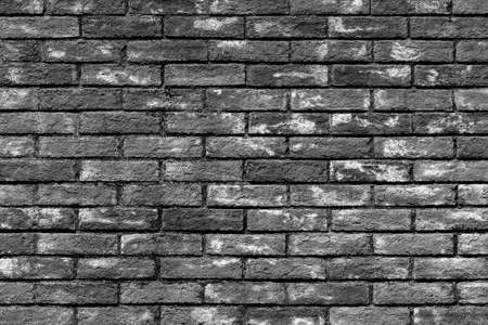 Background of old vintage brick wall texture, black and whiteの写真素材