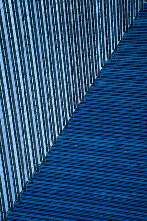 High glass skyscrapers on the streets of Singapore. Office windows background, close upの写真素材