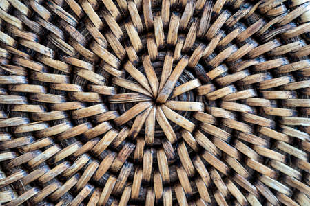 Abstract decorative wooden textured basket weaving. Basket texture background, close up. Abstract natural wicker horizontal background or textureの写真素材