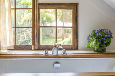 Comfortable white bath in bathroom near the window, Tanzania, East Africa, close up