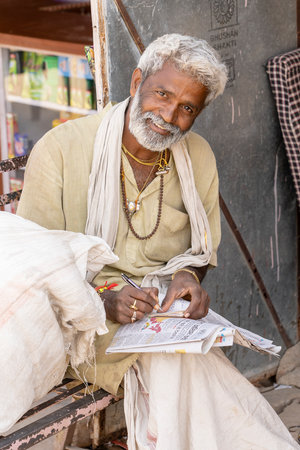 PUSHKAR, INDIA - NOVEMBER 11, 2018: Portrait of Rajasthani man wearing traditional dress visit to holy city Pushkar, Rajasthan, India, close upのeditorial素材
