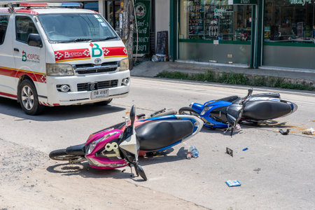 KOH PHANGAN, THAILAND - MAY 19, 2019: Motorcycle accident that happened on the road at tropical island Koh Phangan, Thailand. Traffic accident between a motorcycle on streetのeditorial素材