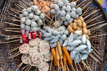Fried food with sticks, Thai style food, Street food in Bangkok, Thailand, close up