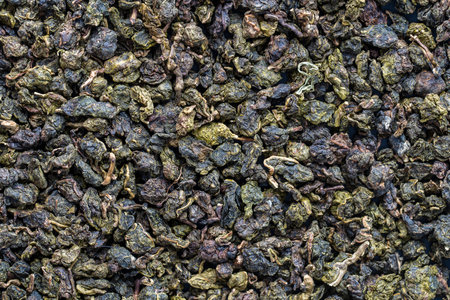Green tea leaves background and texture, macro, Vietnam