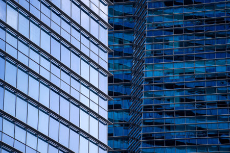 High glass skyscrapers on the streets of Singapore. Office windows background, close upの写真素材