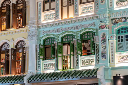 Architectural details of colorful facade of the building in Singapore. Old colonial British...