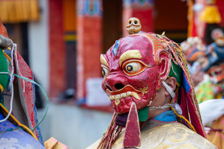 Lamayuru Gompa, Jammu and Kashmir, India - june13, 2015: Monk with colored clothes and mask performs Cham dances, ritual dancing at Takthok festival, Ladakh, Indiaのeditorial素材